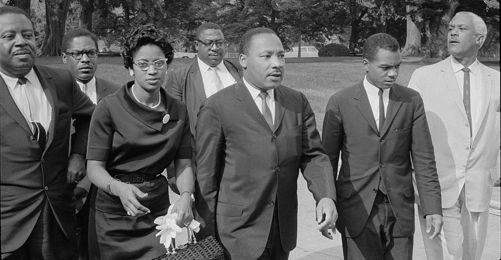 "Martin Luther King Jr. walks with a group of Civil Rights advocates on a trip to the White House